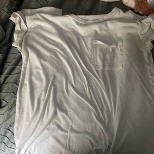 A plain white pocket shirt